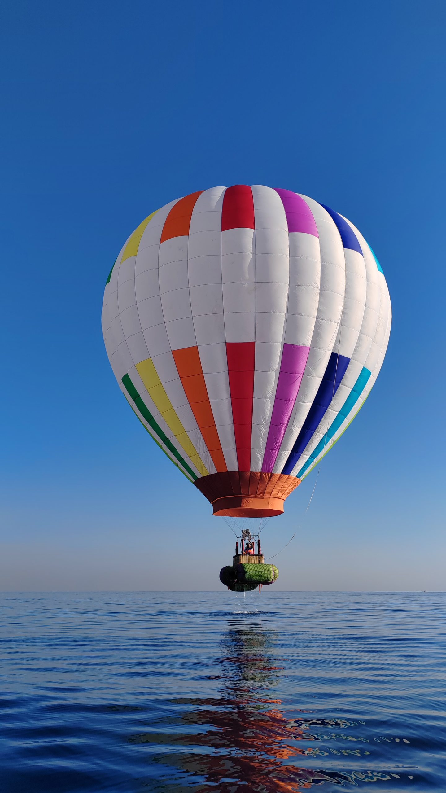 Ocean balloon flying just above the Lovina sea